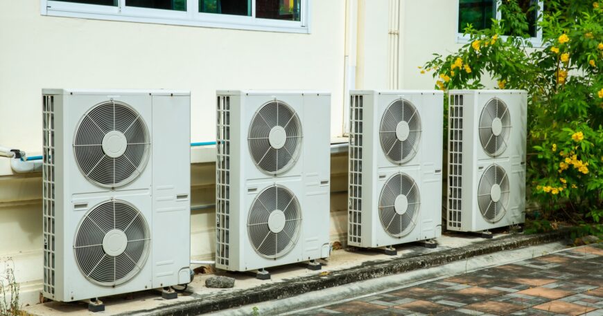 Air conditioner compressor installed in old building.