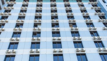 Wall with many air conditioners