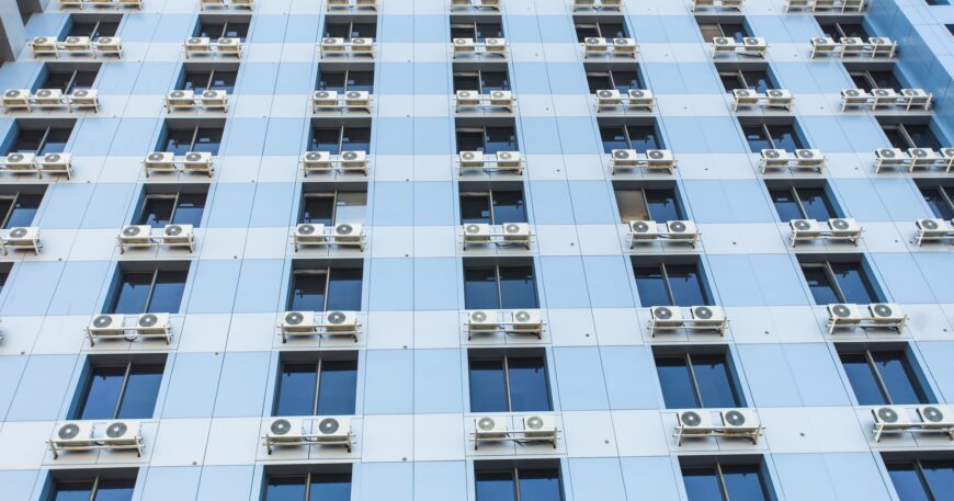 Wall with many air conditioners